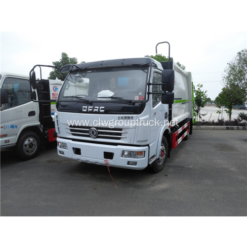 Compactor garbage truck with bin for truck